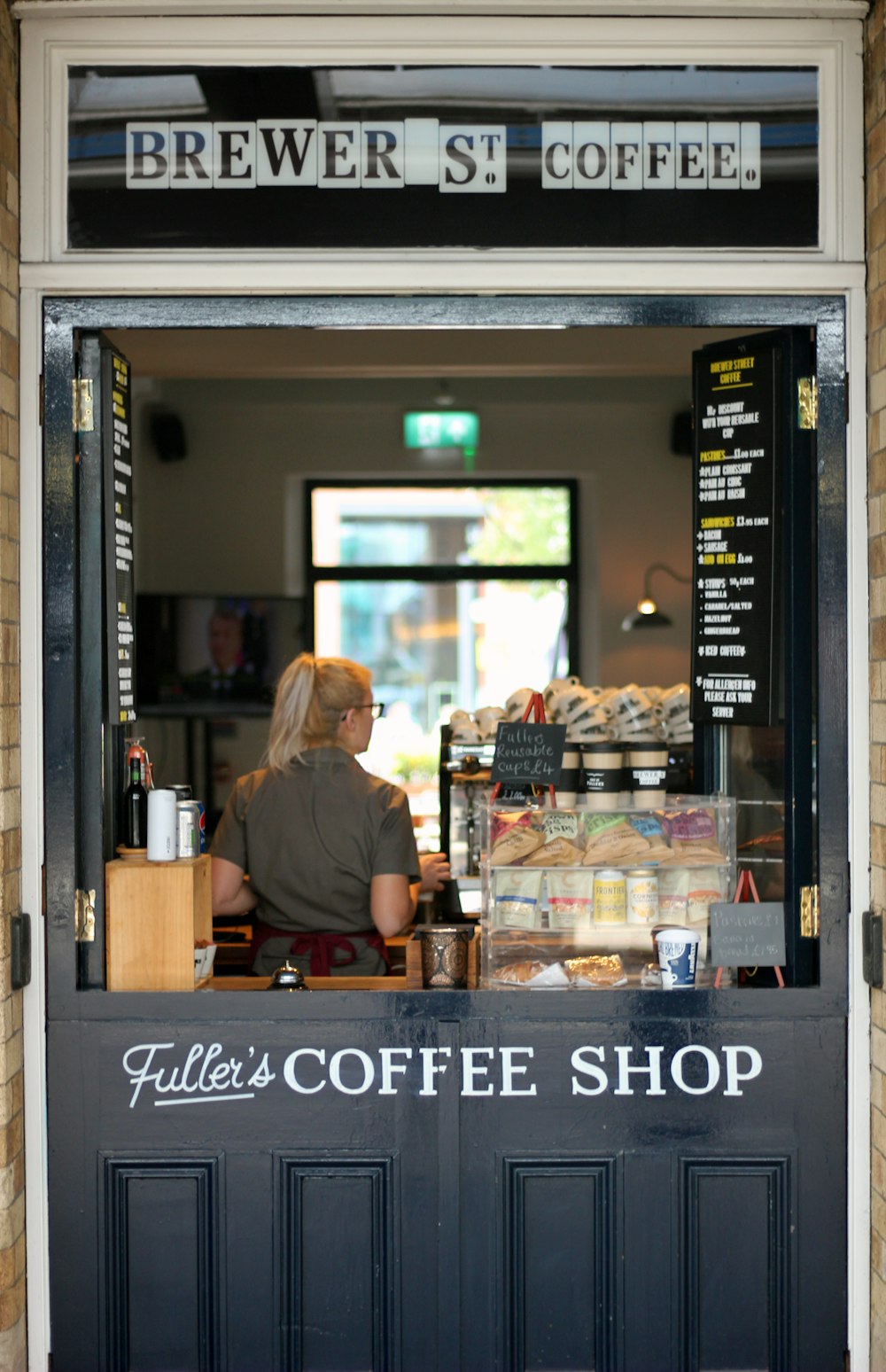 woman standing near display counter