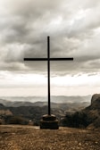 black cross outdoor during daytime
