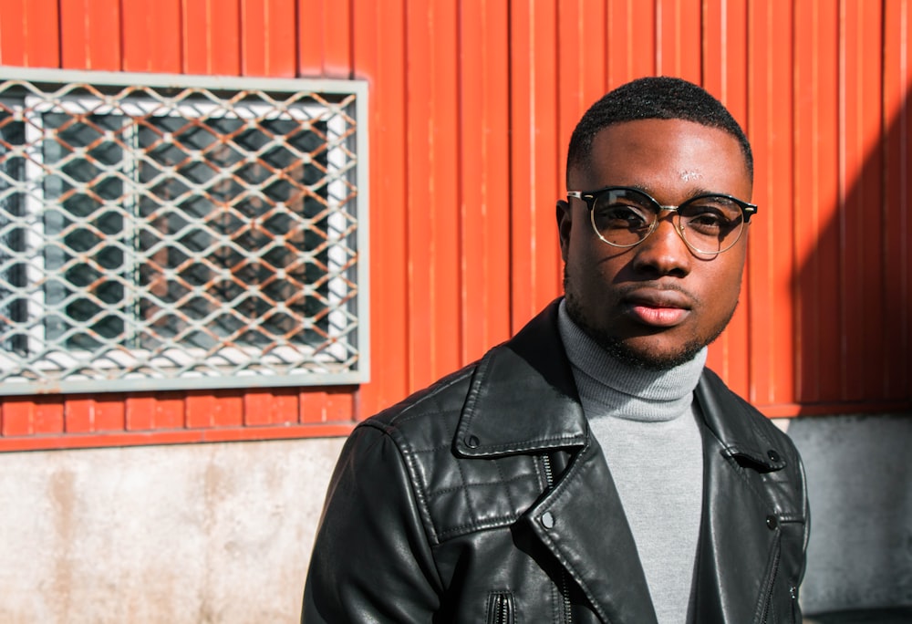 man wearing black framed eyeglasses