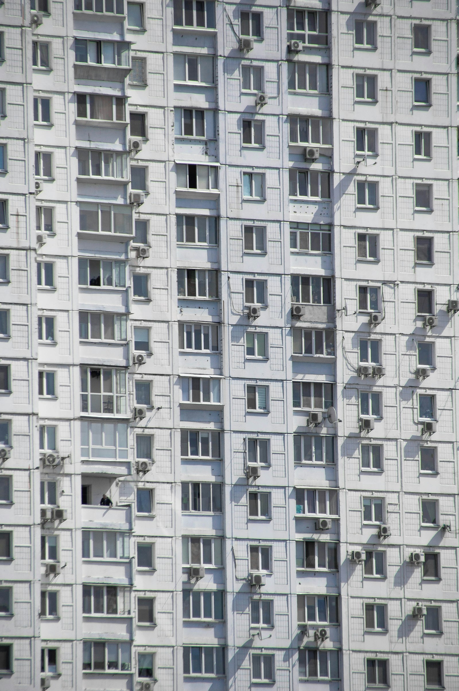 Sony DT 18-250mm F3.5-6.3 sample photo. White apartment building photography