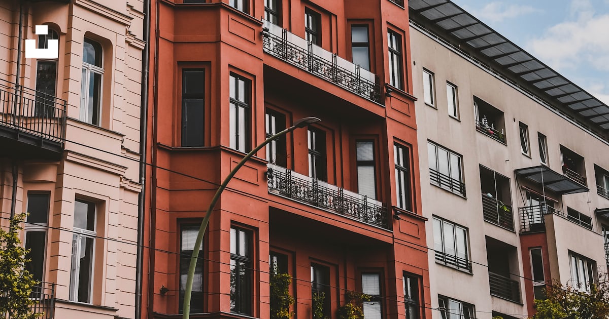 Red high rise building photo – Free Town Image on Unsplash