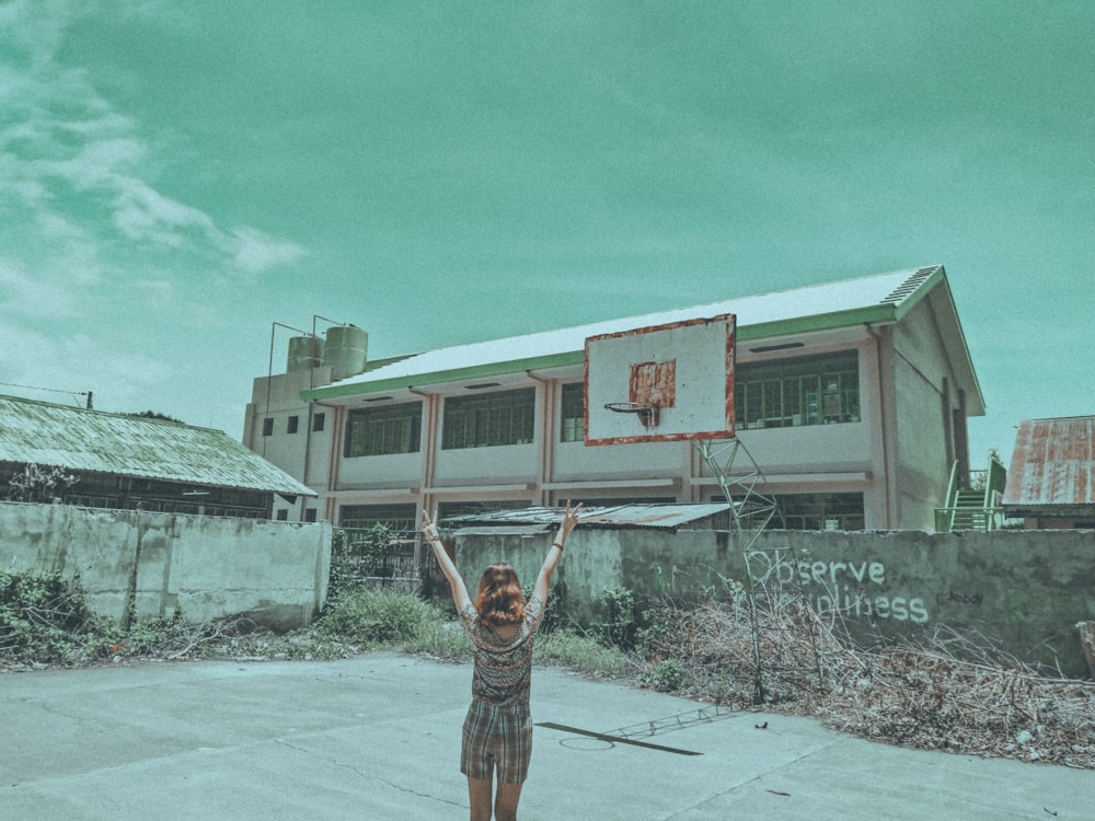 woman standing on the basketball field