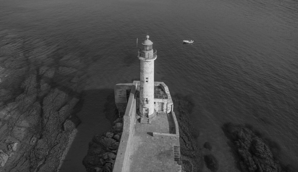 grayscale photography of lighthouse