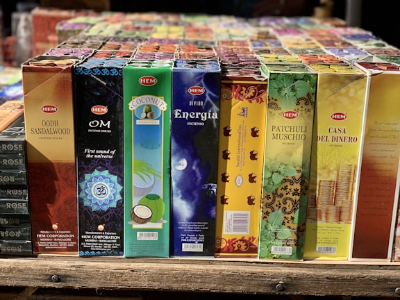 An elegant display of various agarbatti flavors and packaging.