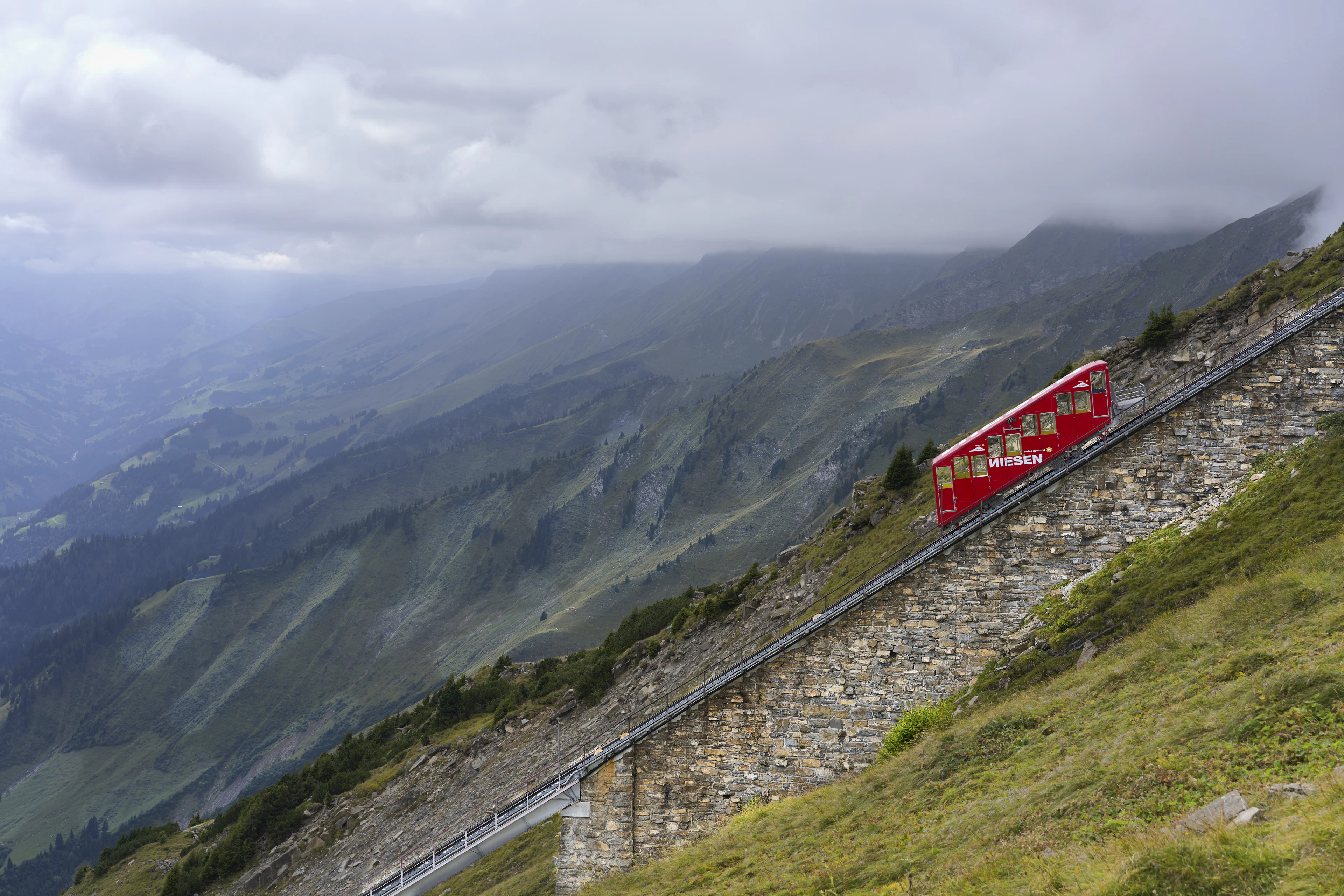 A funicular climbing a Swiss hillside near Bern