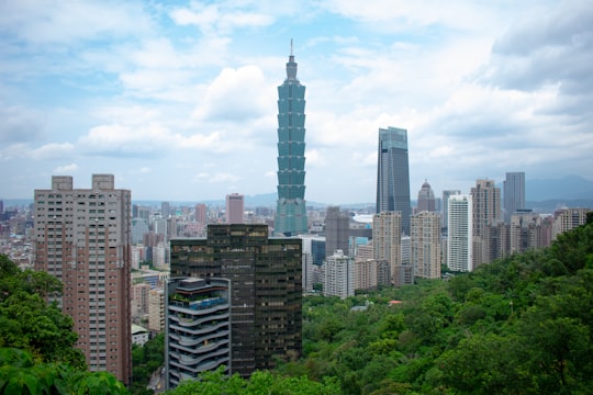 concrete buildings at daytime in Xiangshan Hiking Trail Taiwan