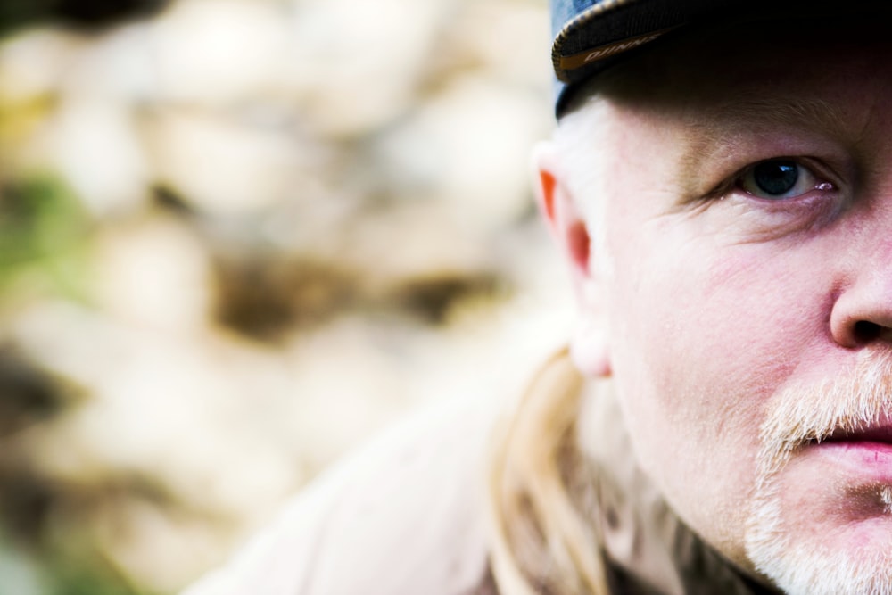 focus photography of man at daytime