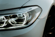 Headlight restoration before and after with clear, bright results.