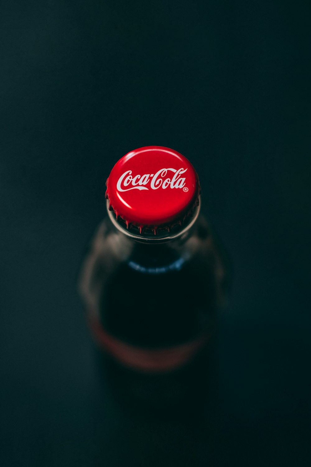 Coca-Cola logo auf glasflasche