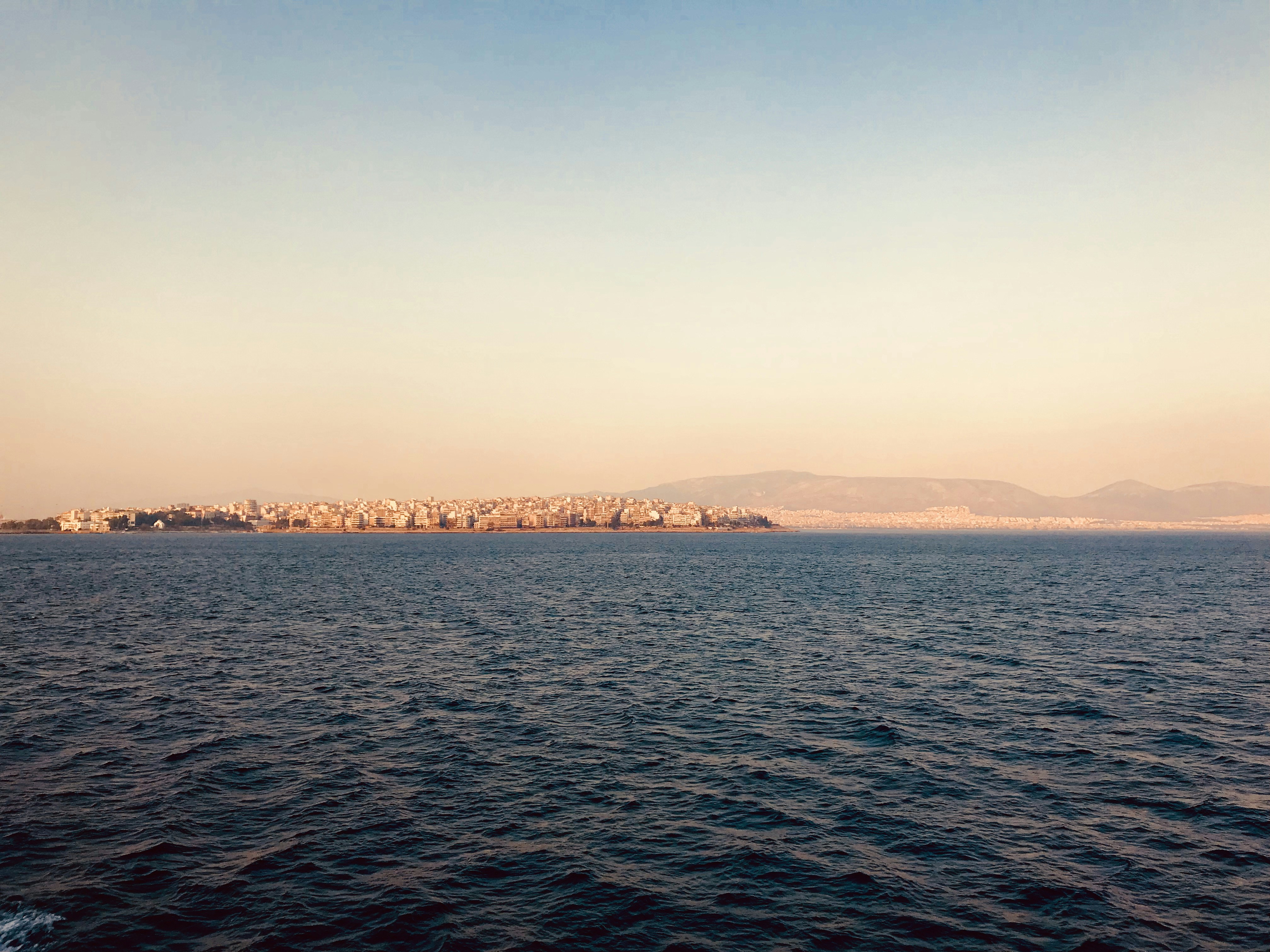 blue sea under blue sky