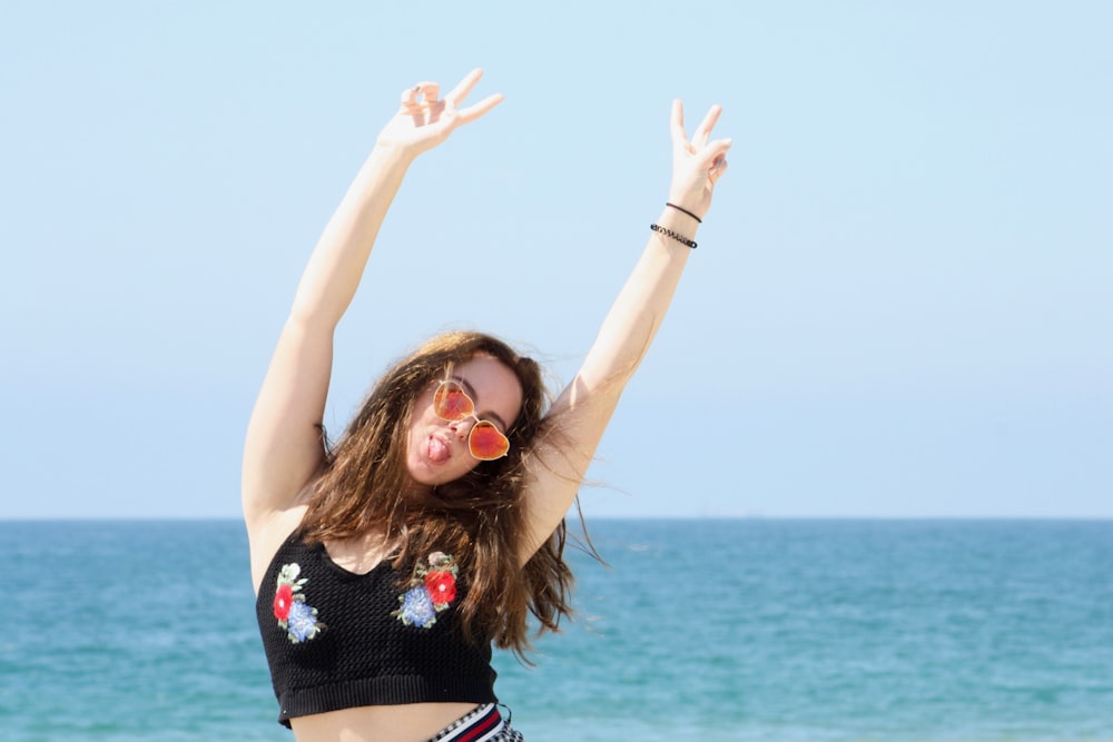 woman wearing black knitted crop top