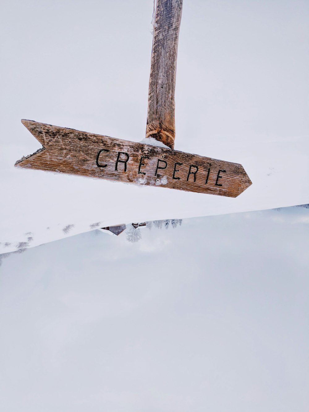 brown Creperie sign