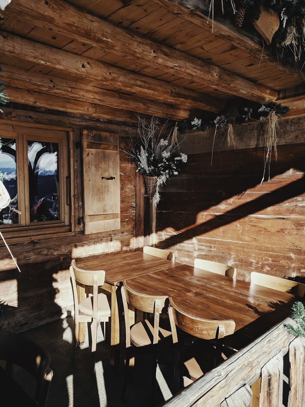 several chairs beside wooden table