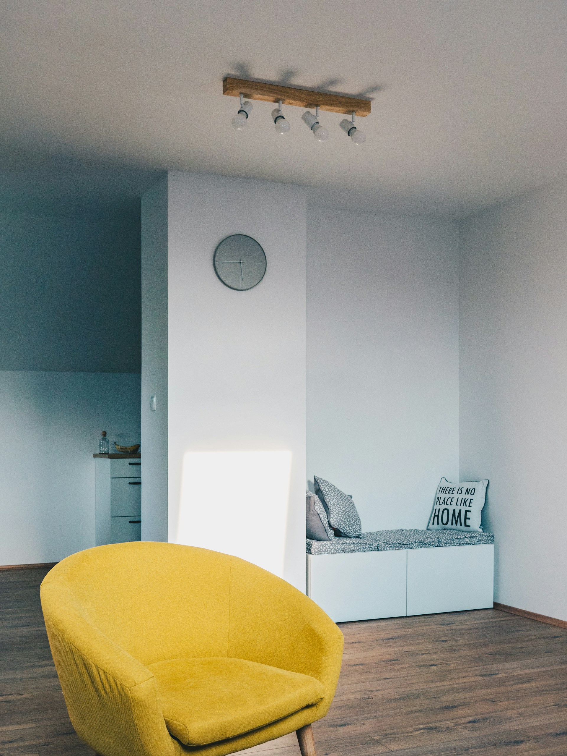 yellow padded sofa chai