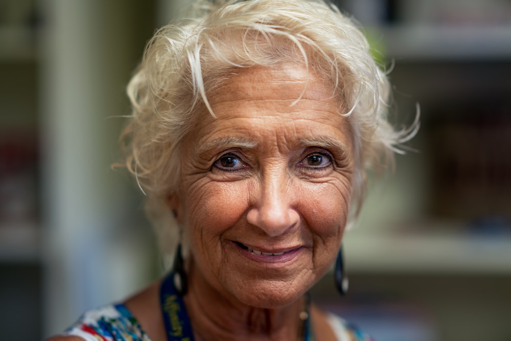 a close up of a person wearing a necklace