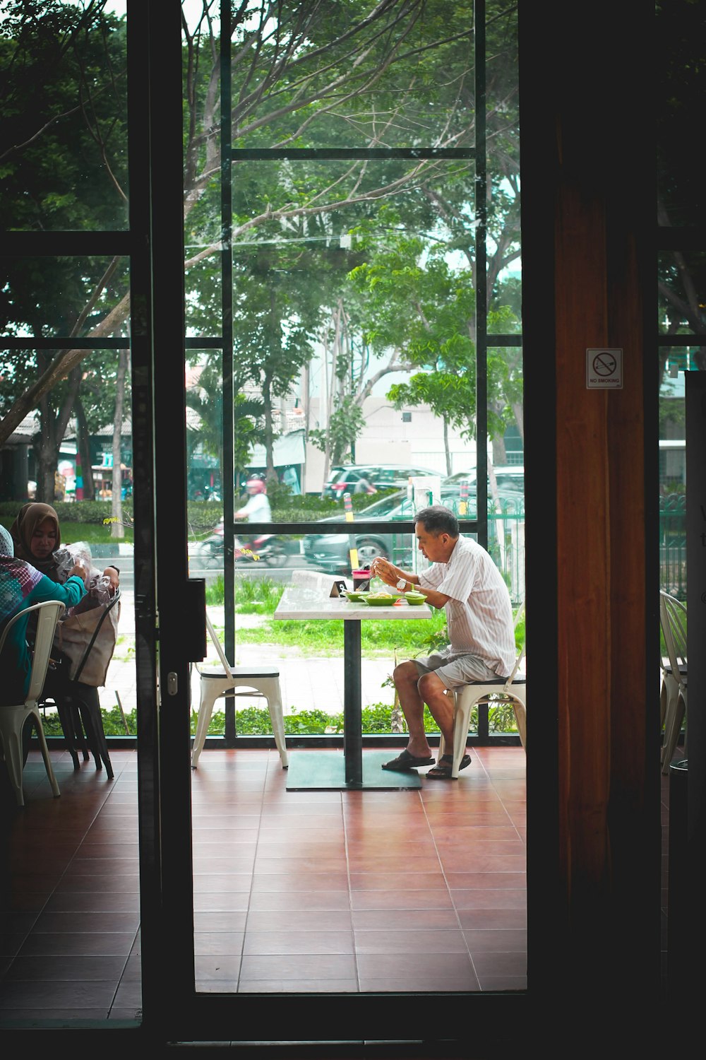 man sitting outdoors