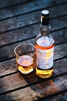 Talisker bottle beside drinking glass
