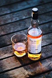 Talisker bottle beside drinking glass