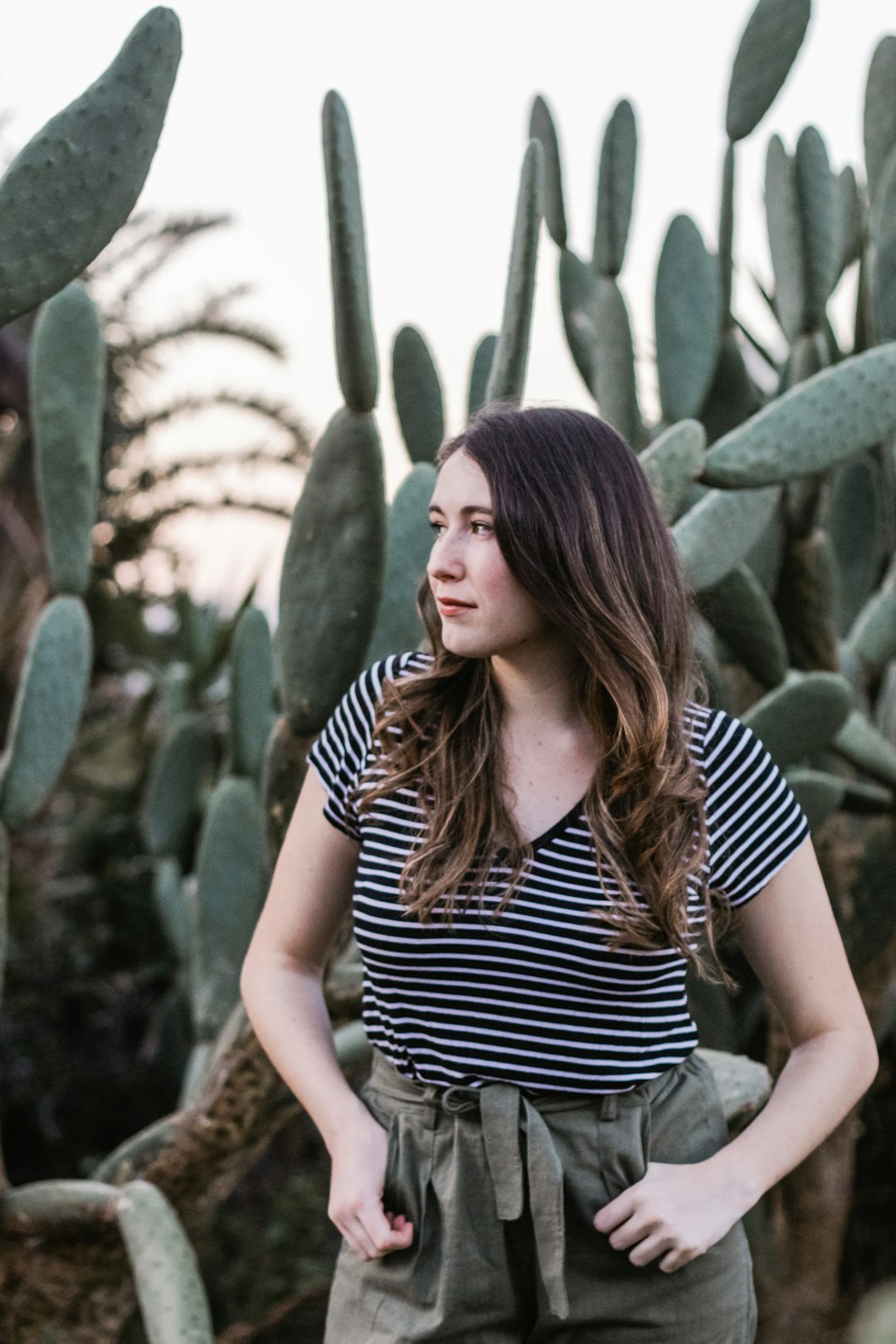 woman wearing black and white striped shirt