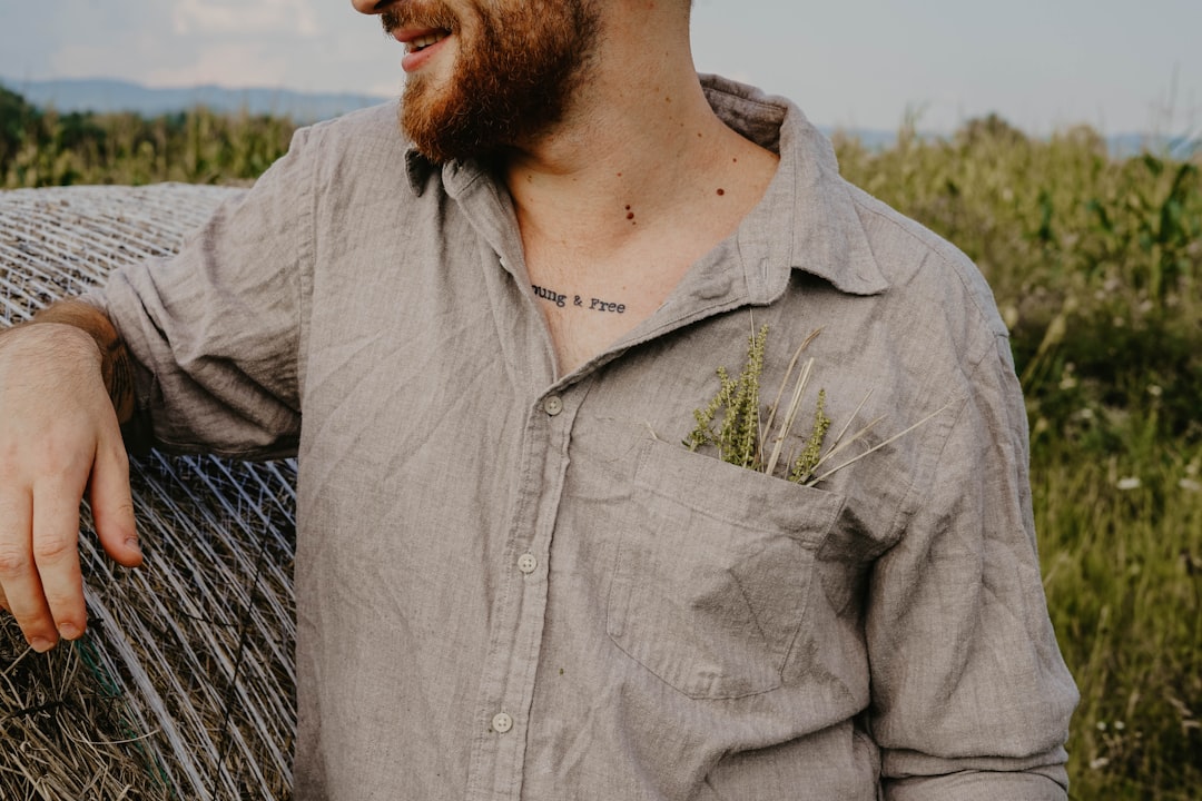 man wears grey dress shirt