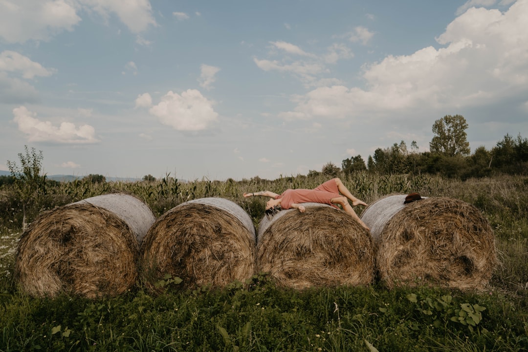 woman lying on hay