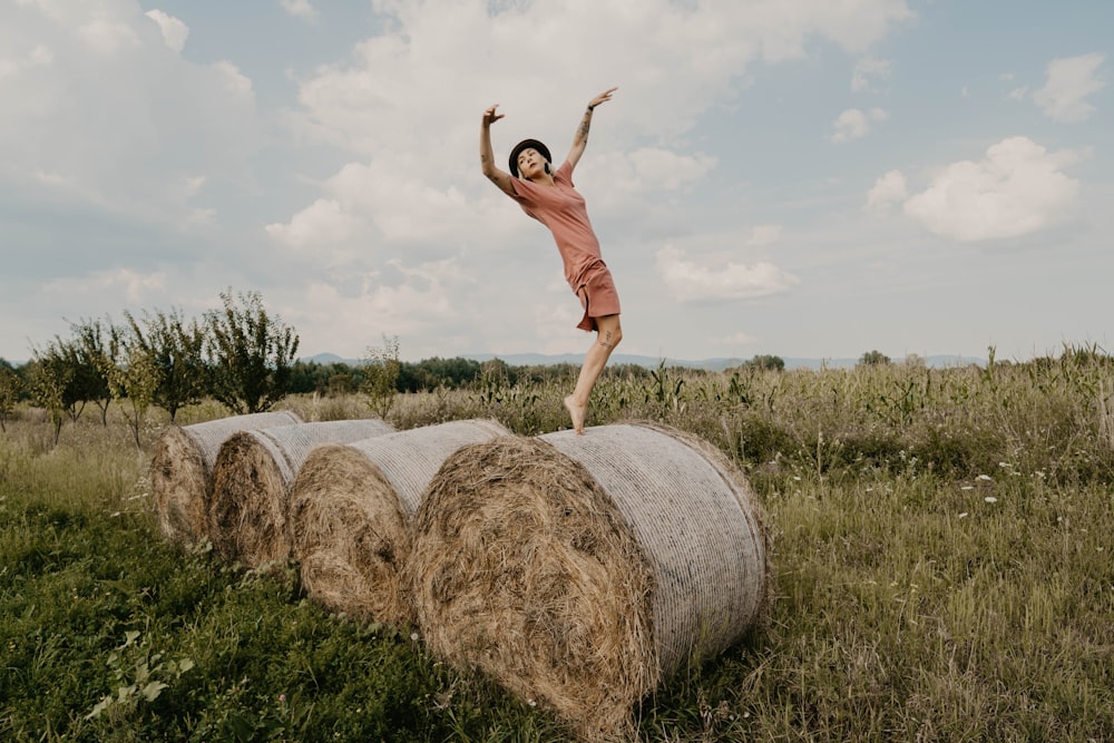 man standing on hay