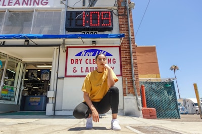man kneeling on ground