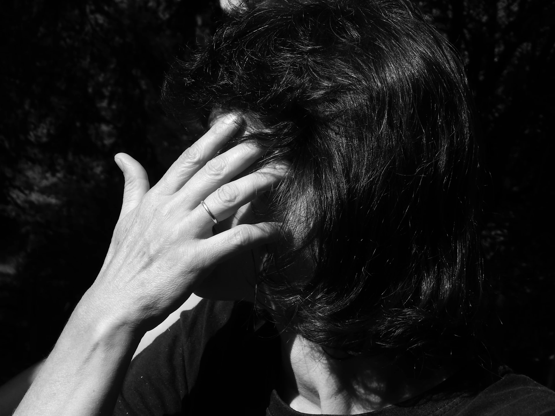 grayscale photo of person in black top