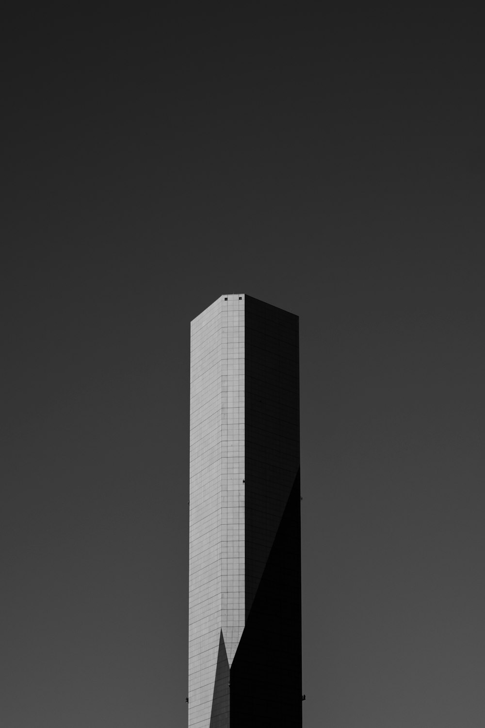 grayscale photography of high-rise building