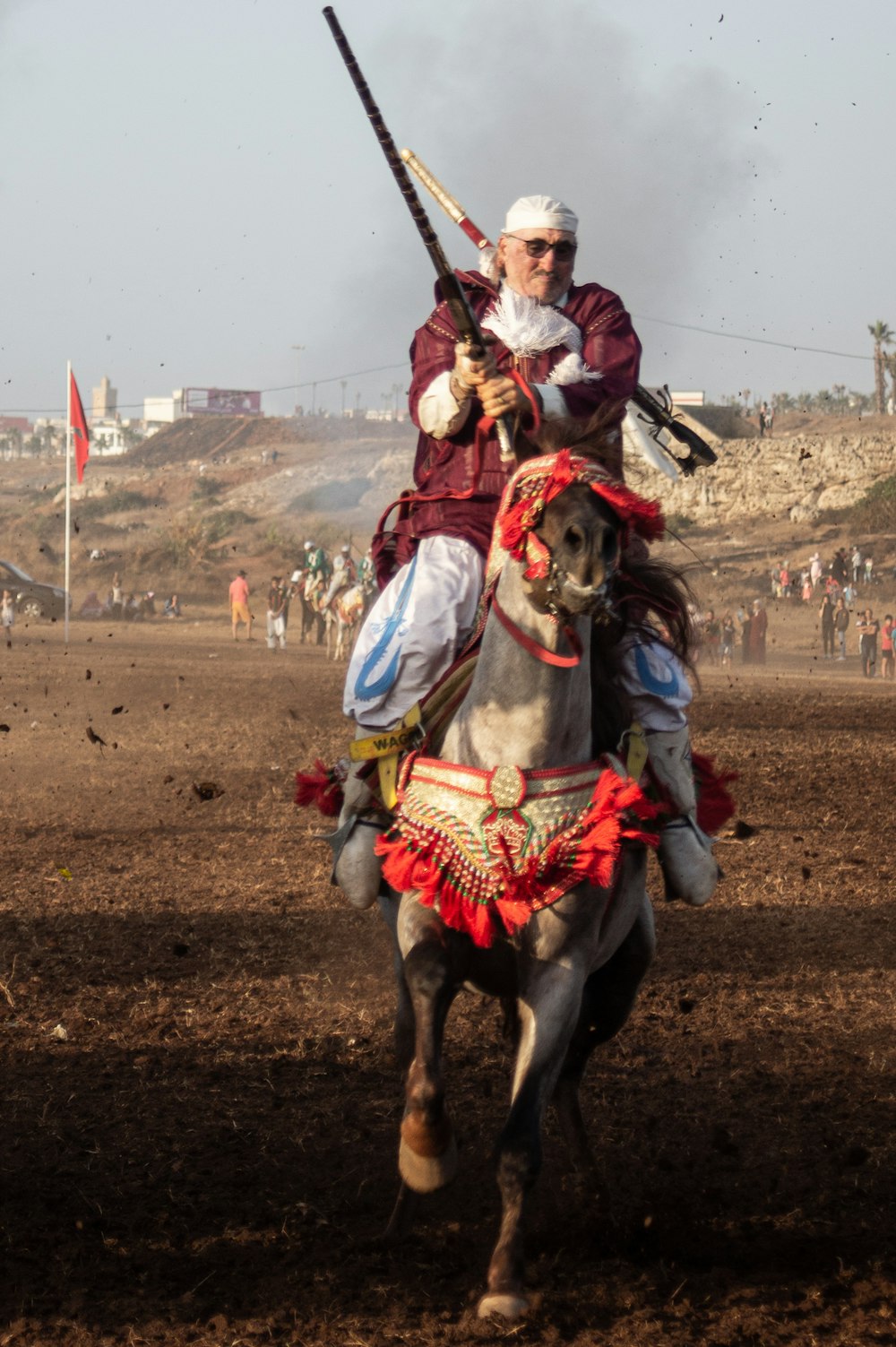 person riding horse during daytime