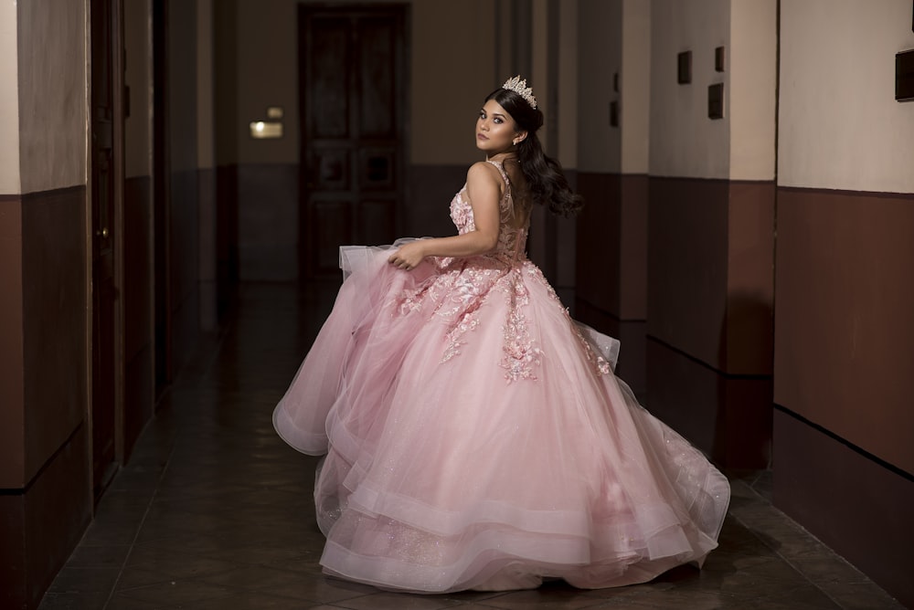 woman wearing pink dress