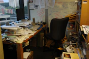 office table with pile of papers