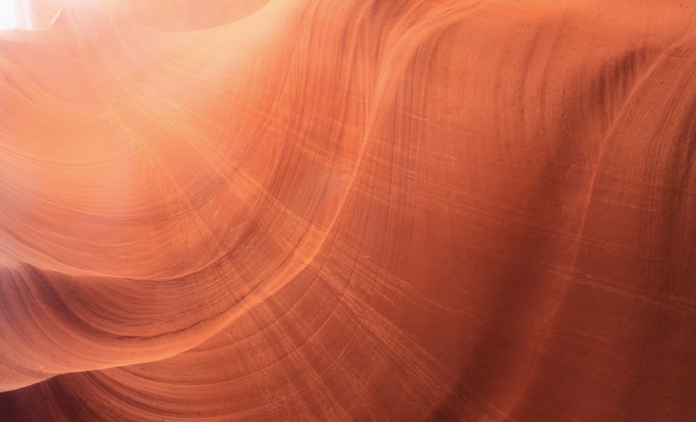 a large rock formation in the middle of a desert