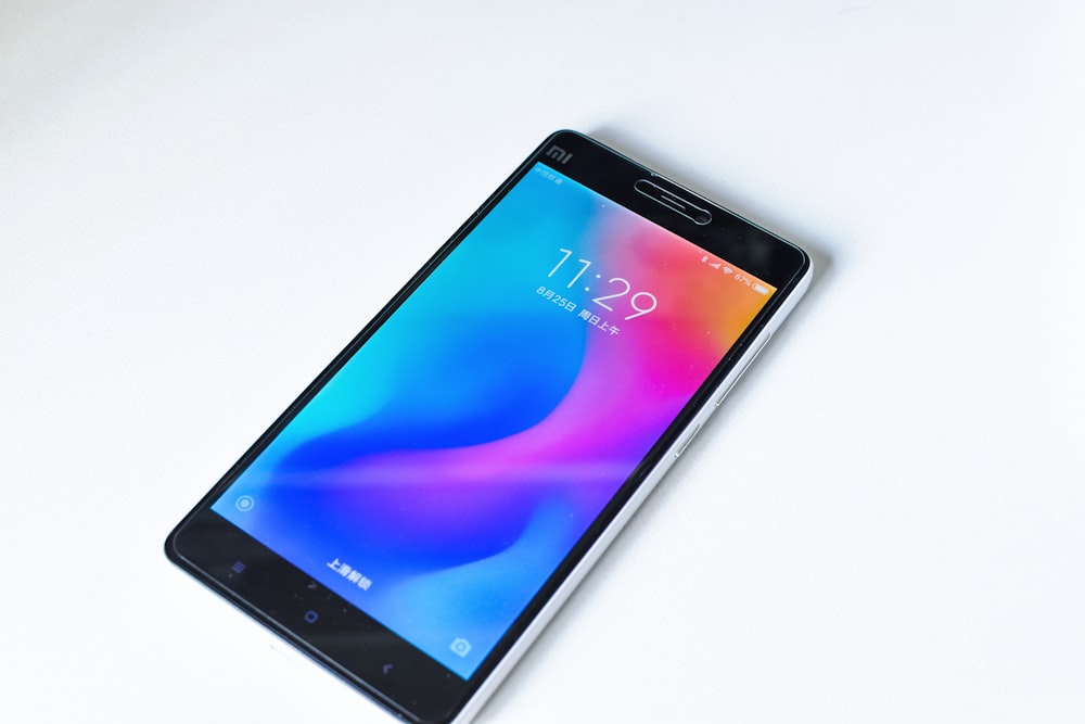 black Xiaomi smartphone turned-on