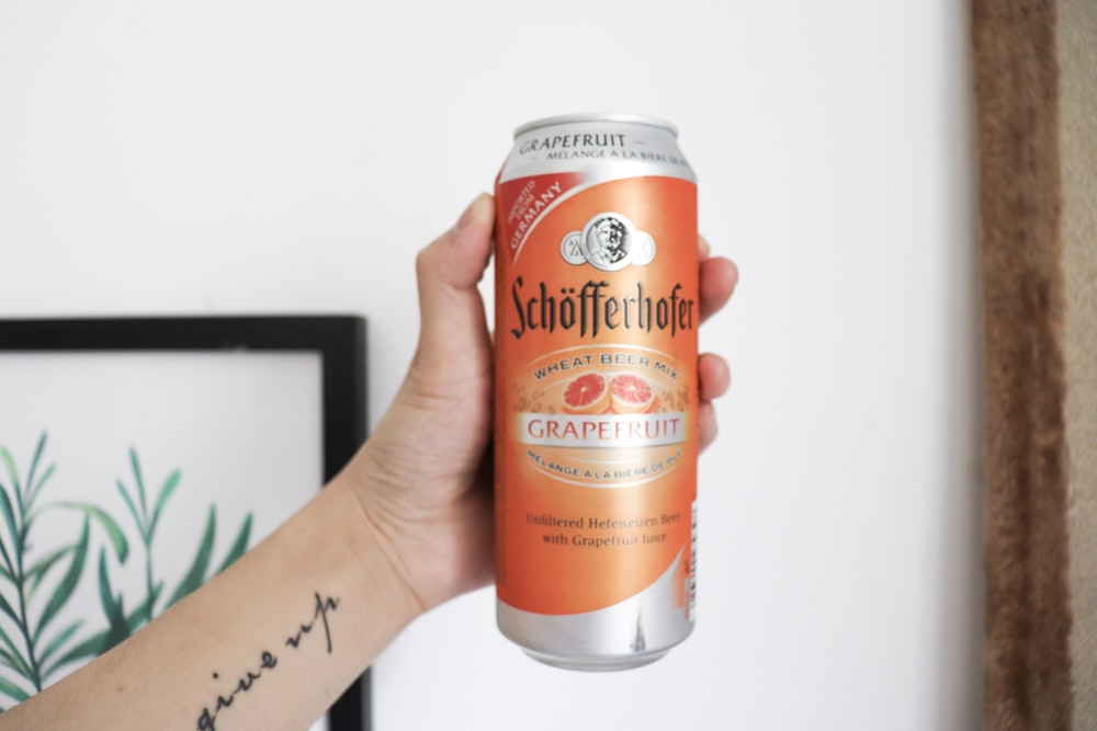 white and orange Schofferhofer beer can