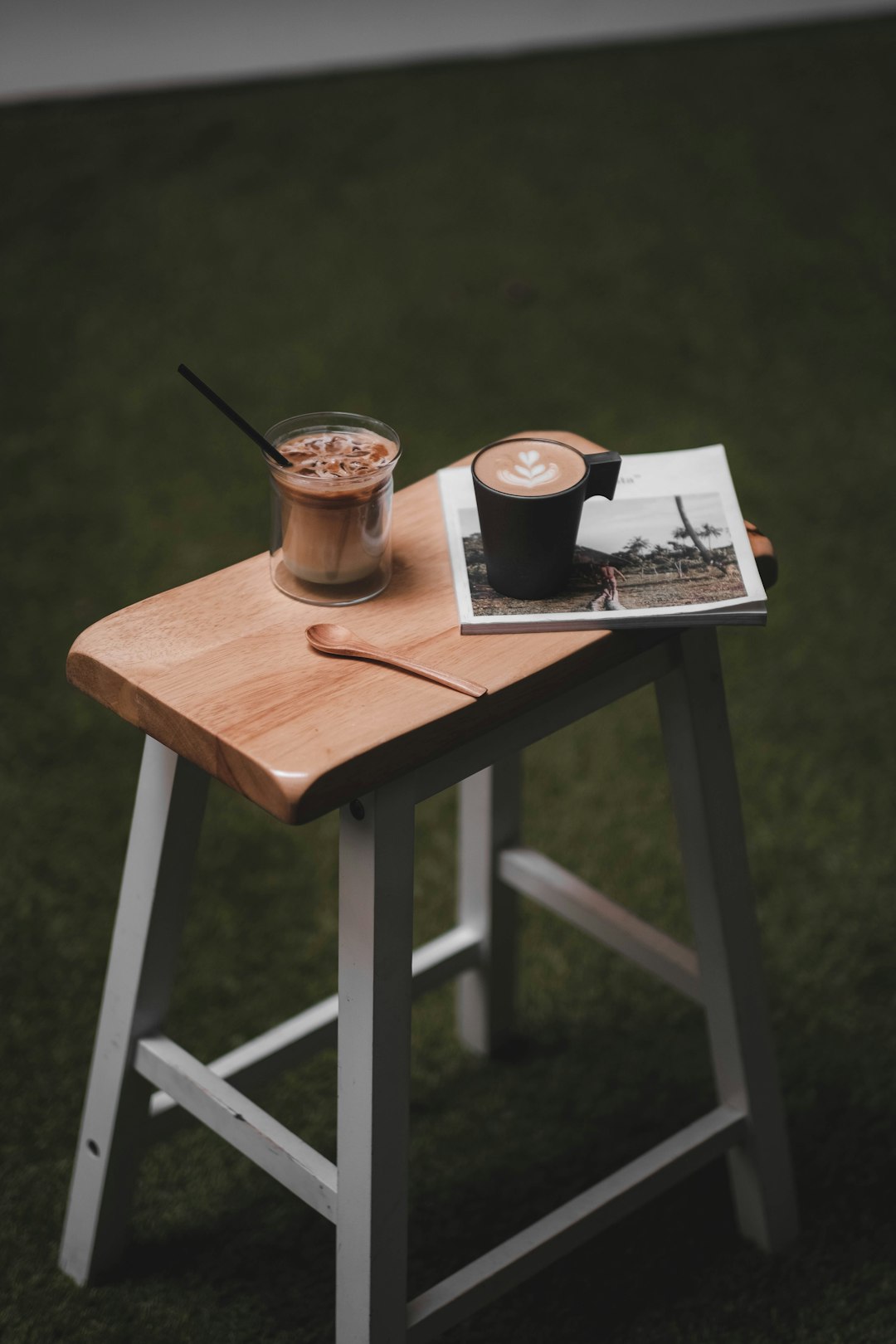 brown ceramic mug on chair