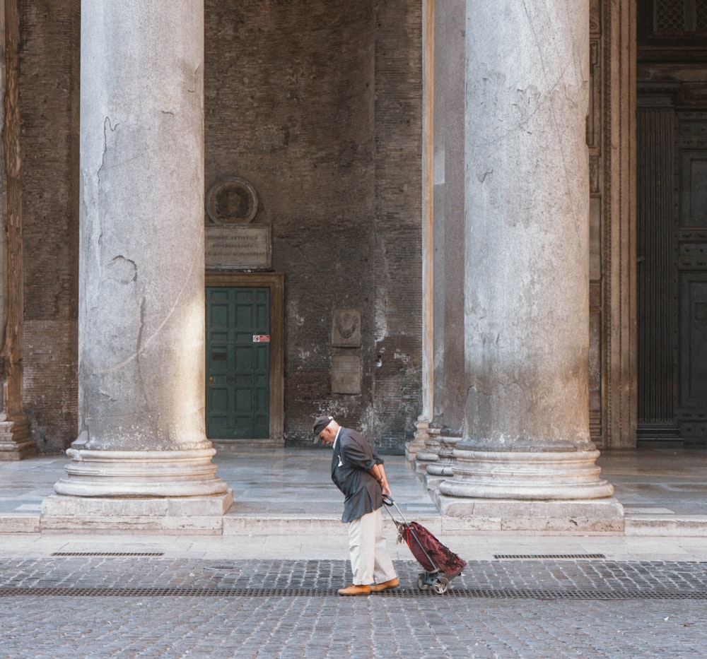 man walks near the building