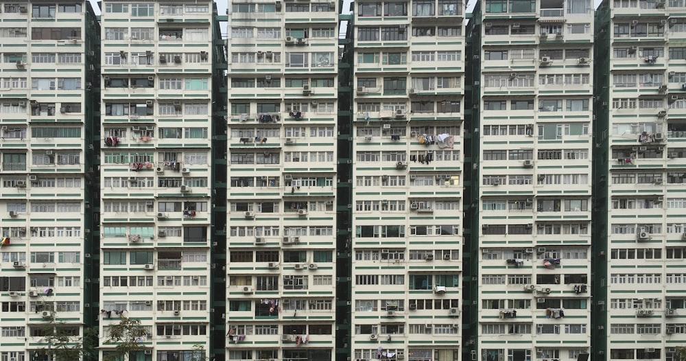 a tall building with lots of windows and balconies