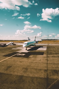 a small airplane is sitting on the runway