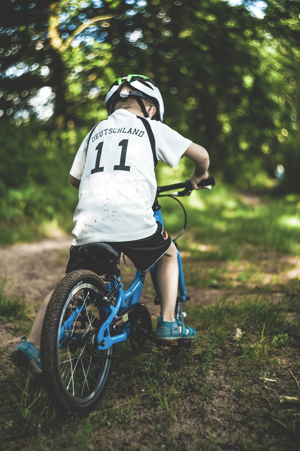 boy riding bicycle