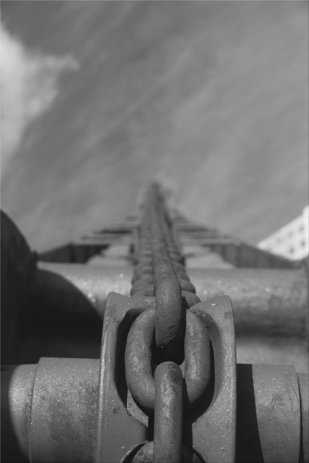 high-angle photography of metal chain