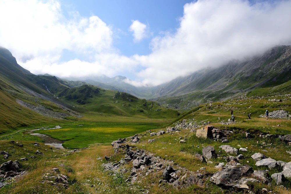 Scenic affordable travel destination with backpackers exploring