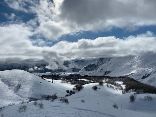 snow covered mountains under clouds at daytime in ს3 Georgia