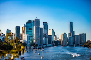 city skyline under clear blue sky during daytime