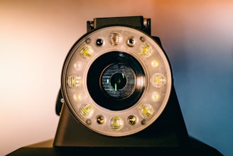 Close-up of a sleek camera lens with glowing AI circuitry patterns.