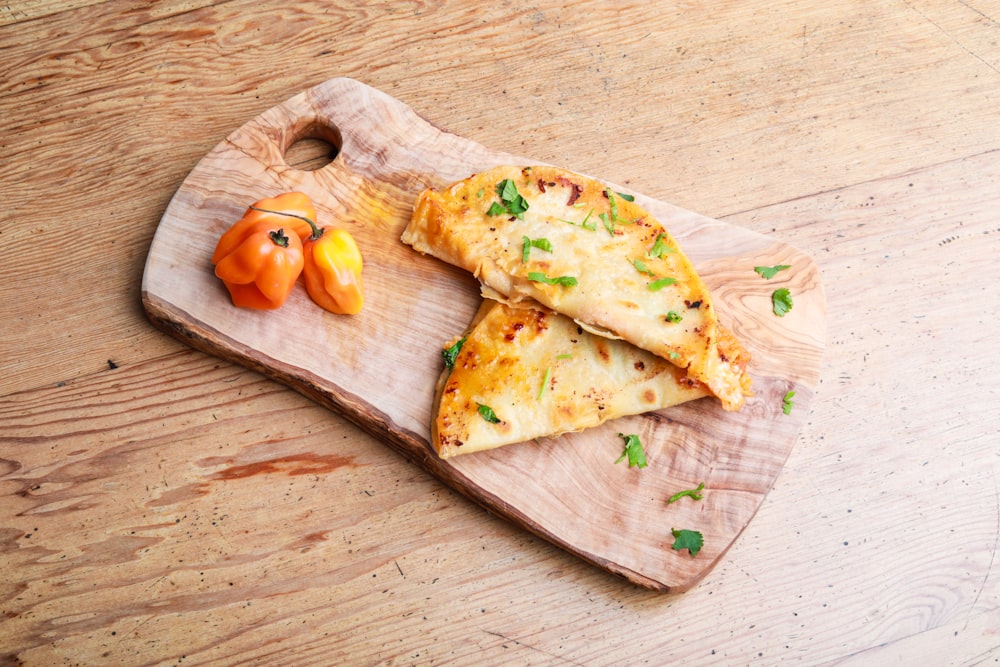 two omelettes on chopping board