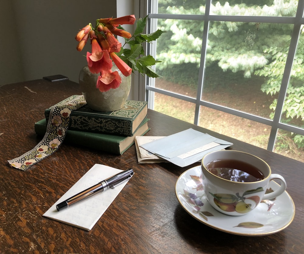 cup of tea beside card