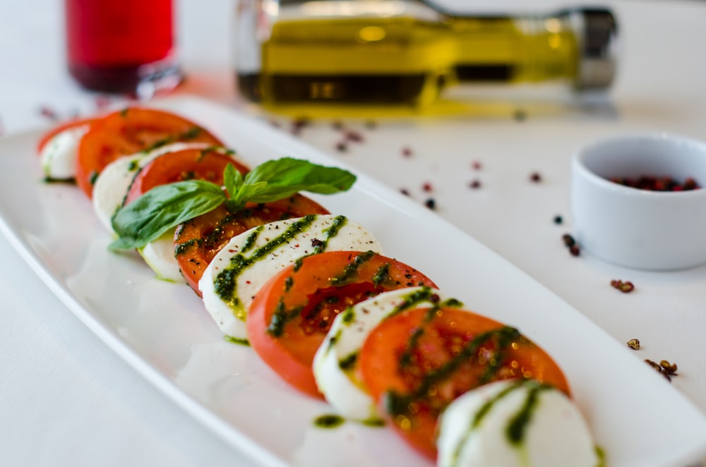 sliced vegetables on white ceramic saucer