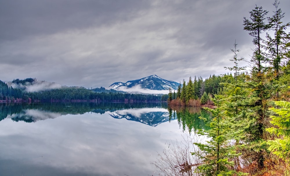 body of water under gray sky