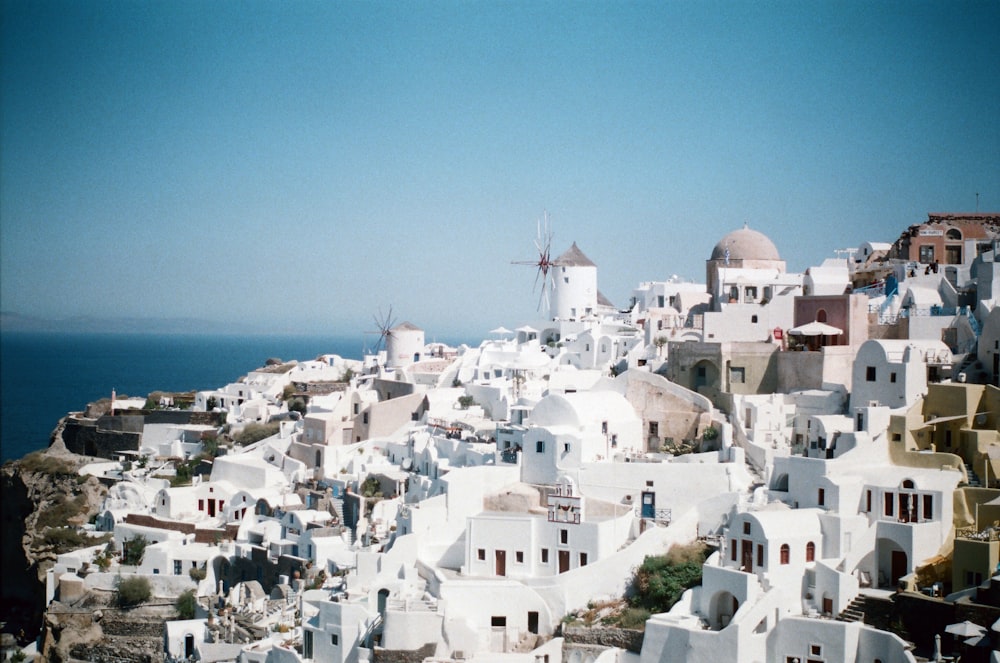 white painted houses near sea